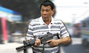 Duterte poses with automatic weapon