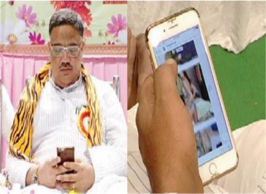 Kanataka Congress Minister caught watching Porn stuff during in function