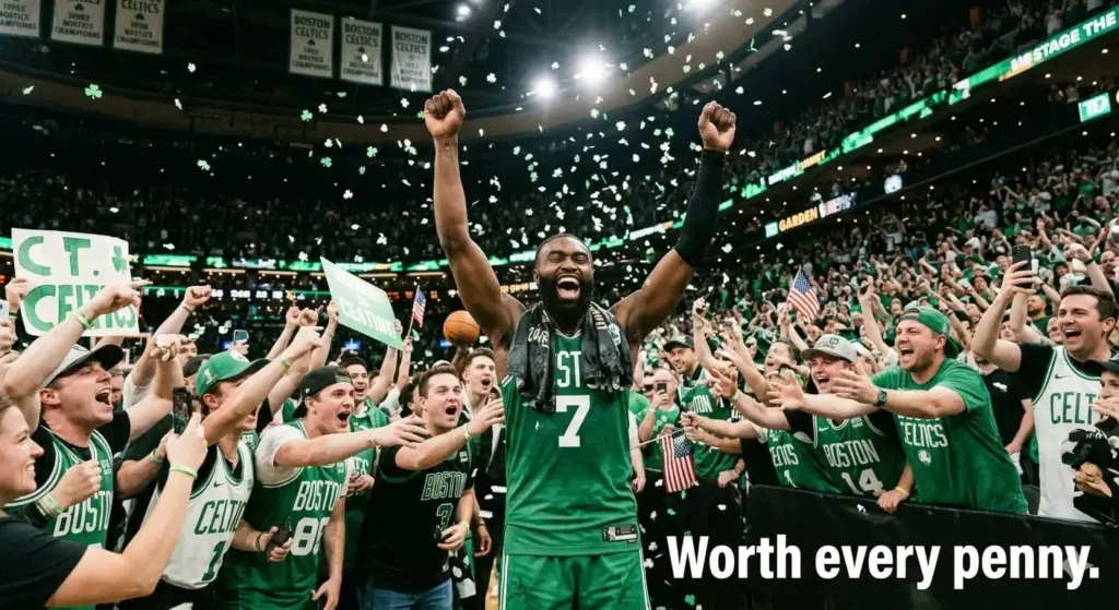 Jaylen Brown celebrating with Celtics fans at TD Garden after championship win